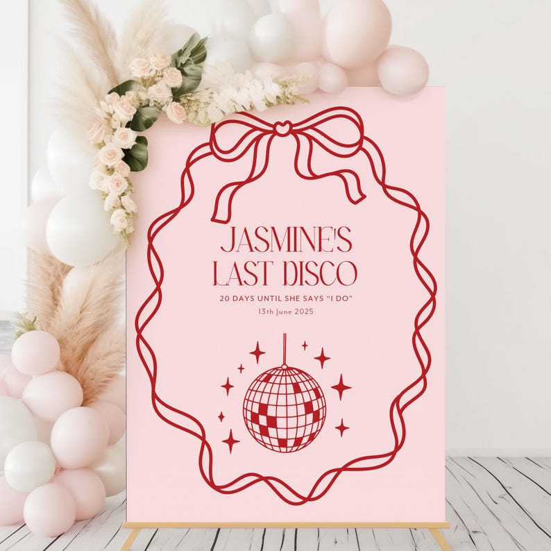 May include: A pink and red sign with a red ribbon and bow, a disco ball, and the text "JASMINE'S LAST DISCO 20 DAYS UNTIL SHE SAYS 'I DO' 13th June 2025".