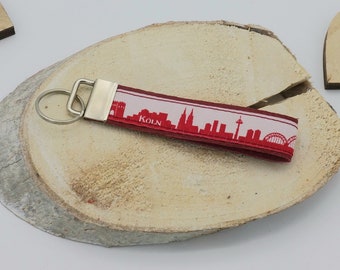 Leather keychain with Cologne skyline fabric border