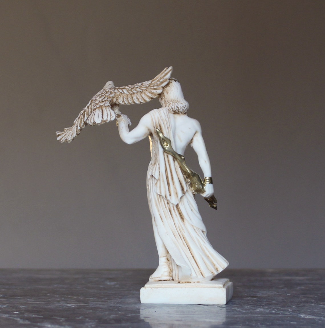 mythos statue