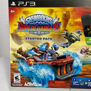 May include: A Skylanders Superchargers Starter Pack for the Playstation 3 video game console. The box features a red and black vehicle with a blue and black character in the driver's seat. The box also features the game's logo and the words "Starter Pack".