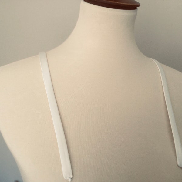 Detachable straps. Off white, 1/2 inch wide ,soft satin