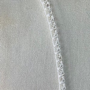 Detachable straps. Beaded with crystals and pearly beads, on a pure silk spaghetti strap