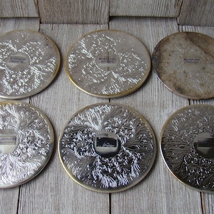 7 Piece Silver Plated Coaster Set NOS