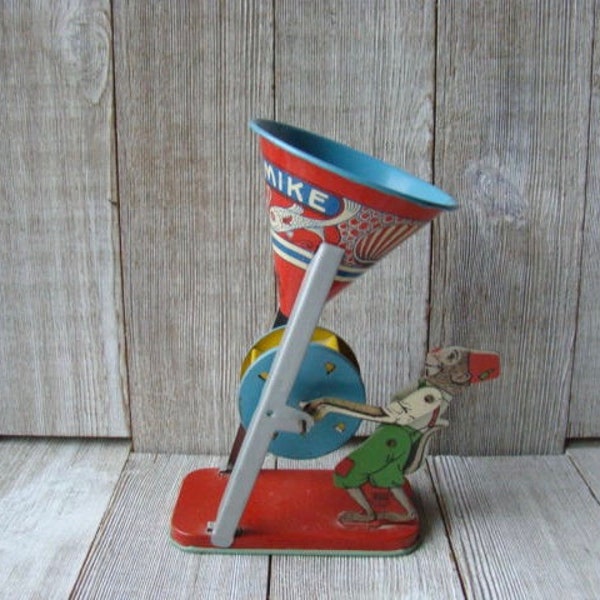 Vintage Busy Mike Sand Powered Tin Toy