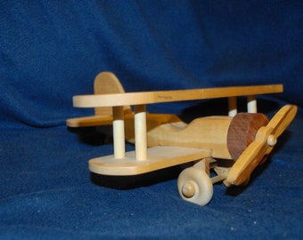 wooden airplane ride on toy