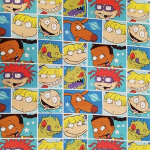 Rugrats Block Fabric, 100% Cotton, Novelty Material, by-the-yard and Fat Quarter Increments Available, Susie Tommy Angelica Spike Chuckie