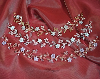 May include: Three flexible hair vine accessories featuring white floral accents, clear crystal beads, and small white pearls. The vines are constructed with thin metallic wire in gold and silver tones, arranged in a delicate, branching botanical pattern.