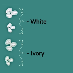 May include: Two groups of white and ivory pearl beads. The top group is labeled "White" and the bottom group is labeled "Ivory".