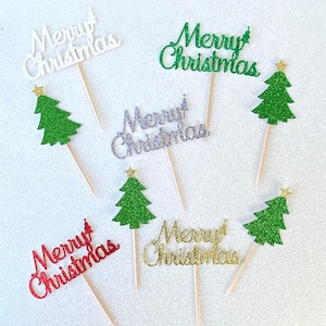 May include: Six cupcake toppers with glitter paper cutouts of Christmas trees and the words "Merry Christmas" in various colors, including white, green, silver, gold, and red.