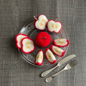 Set di mele rosse all&#39;uncinetto