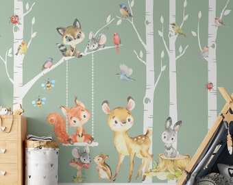 May include: A green wall with white birch trees and woodland animal decals. The decals include a fox, squirrel, deer, rabbit, and birds. There is a wooden teepee tent in the foreground.