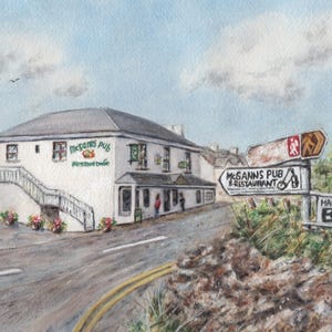 May include: Watercolor painting of McGann's Pub & Restaurant and Harvest Moon B&B. The white building has a gray roof and a staircase. Road signs point the way. The sky is blue with clouds. Flowers in pots line the staircase.