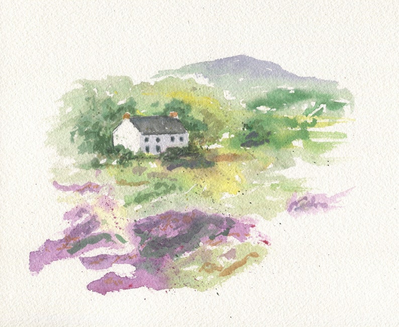 May include: Watercolour painting of a white cottage with a dark grey roof set in a green landscape. A mountain is in the background, and purple flowers are in the foreground. The artwork is on textured paper.