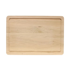 May include: A rectangular wooden cutting board with rounded corners. The light-colored wood grain is visible across the surface. A recessed groove runs around the perimeter of the board.