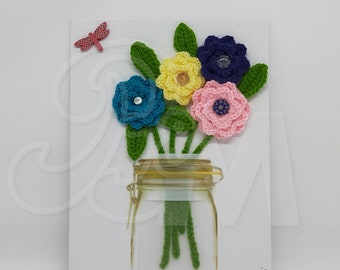 Tableau bouquet de fleurs printanières fait main au crochet dans leur bocal