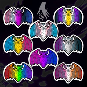 May include: Set of nine colorful bat stickers with different color gradients. Each sticker features a cartoon bat with a white face and black eyes.