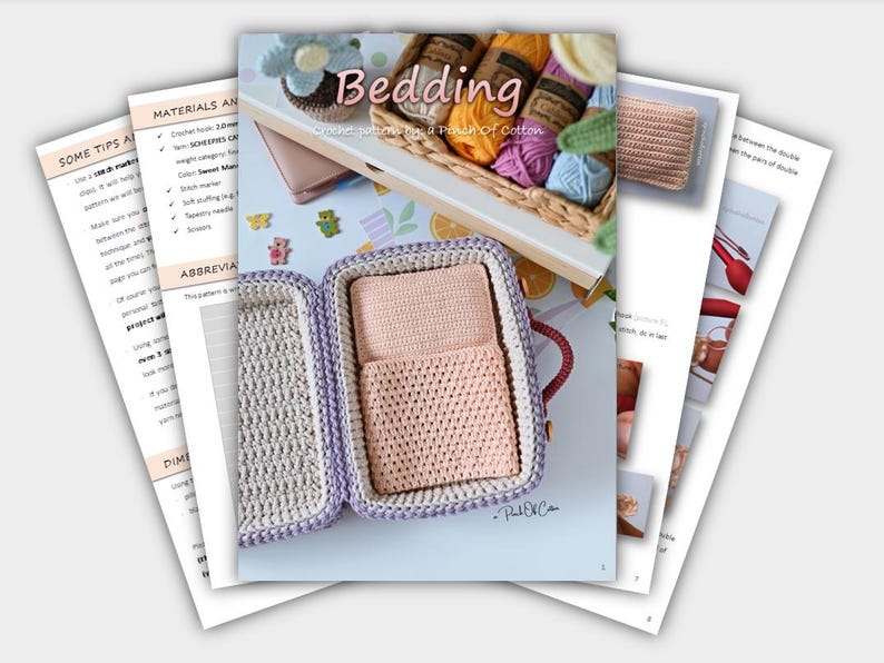 May include: A crochet pattern book titled "Bedding" with a light pink crochet case containing two crochet items. The book features a basket of yarn and a crochet flower. Several pages of instructions are visible.