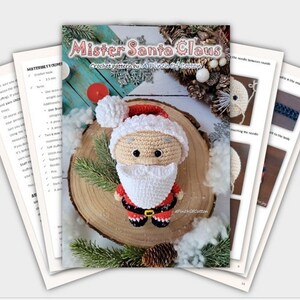 May include: Crochet pattern for a Mister Santa Claus amigurumi doll. The pattern includes instructions for making the head, body, and beard. The doll is wearing a red and white Santa suit with a black belt. The pattern is written in English.