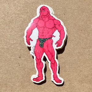 May include: A pink, muscular figure with a green and black striped loincloth. The figure has a large head with a furrowed brow and a large nose. The figure is standing with its arms at its sides. The sticker is signed "YungSirFin".