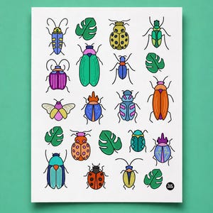 May include: A white print featuring colorful cartoon beetles and green monstera leaves. The insects are in various colors, including blue, green, orange, and yellow, with black outlines. The artwork is on a white background.