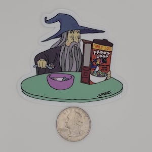 May include: A sticker featuring a cartoon wizard eating cereal. The wizard wears a blue hat and purple robe, and is seated at a green table with a purple bowl of cereal and a box of Froot Loops. The text "Follow Your Nose!" is visible.