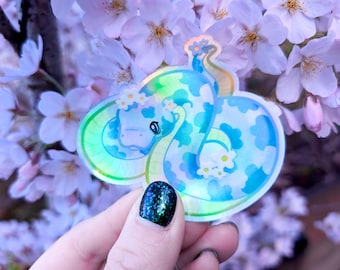 Daisy Snake FIRE Holographic Sticker – Cute Snake with Flowers – Rainbow Holo Vinyl, Waterproof, Dishwasher Safe, UV Resistant