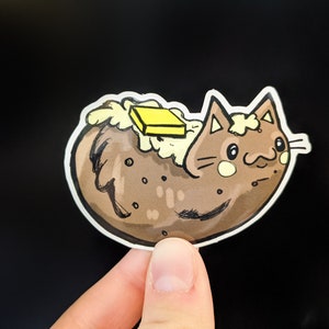 Pegatina de patata al horno con gato. Resistente a la intemperie y apta para lavavajillas. Ideal para botellas de agua, portátiles, fundas de teléfono o incluso como pegatina para parachoques.