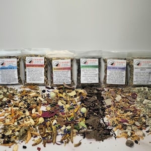 May include: Six clear bags of Crabby Cafe crab food mixes, each with a different label. The mixes include "Under the C", "Shrimp Stirfry", "Summer Garden", "Seaweed Surprise", "Colorful Crabby", and "Shell Strengthening Medley". The ingredients are visible.