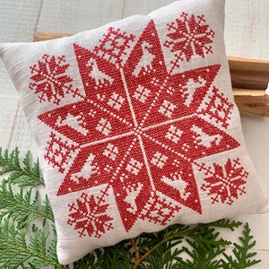 Pillow and tablecloth with Slavic symbols