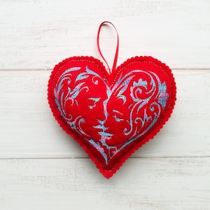 Embroidered felt heart ornament