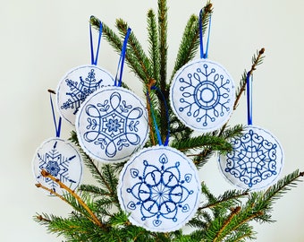 Embroidered felt snowflakes set