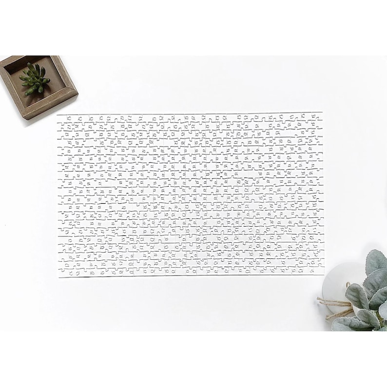 May include: A clear plastic sheet with a repeating pattern of small, irregular shapes. The sheet is designed for use with a craft cutting machine.
