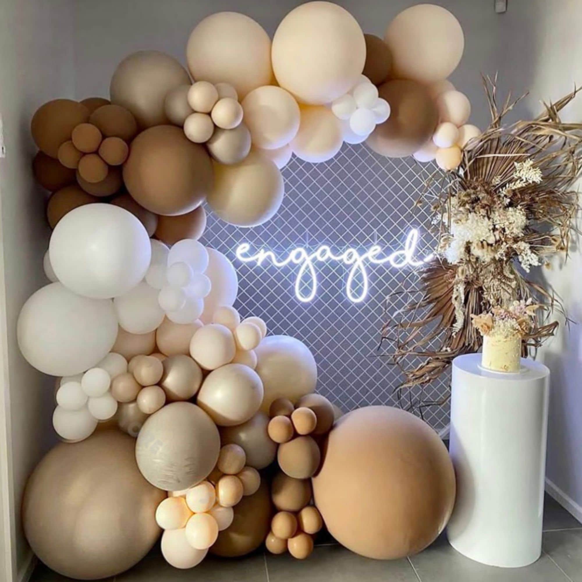 pink and brown balloon garland