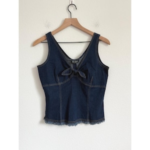 May include: Dark blue denim tank top with a V-neckline and a bow detail at the bust. The top has a raw hem and visible stitching. The brand name "A-line" is visible on the garment.