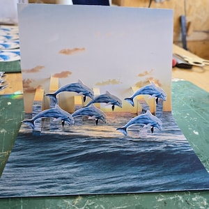 Carte POP-UP « Dauphins au coucher du soleil »
