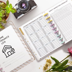 May include: Two white planners with black text. The planner on the left is labeled "Home Maintenance Log" and has a house icon with a checkmark. The planner on the right is labeled "Systems Maintenance by Month" and "Safety Inspection Checklist".