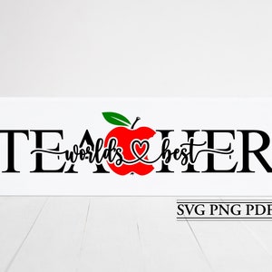 Op de afbeelding: Een wit bord met zwarte tekst die "World's Best Teacher" zegt met een rode appel met een groene steel en een hart in het midden.