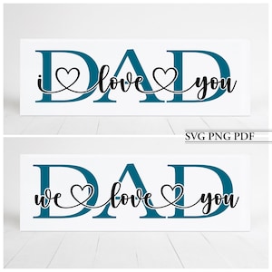 Puede incluir: Dos letreros blancos con la palabra "DAD" en letras azul turquesa. El primer letrero dice "Te amo" con un coraz&oacute;n entre cada palabra. El segundo letrero dice "Te amamos" con un coraz&oacute;n entre cada palabra.