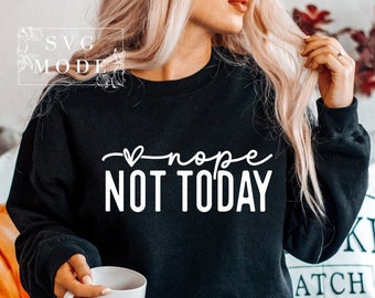 May include: Black sweatshirt with white text that reads "nope not today" with a heart symbol before the word "nope".