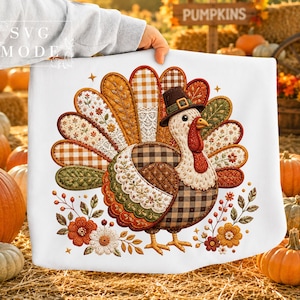May include: A white decorative item with a Thanksgiving turkey design. The turkey wears a pilgrim hat and has a patchwork of brown, orange, and green patterns. Floral accents and the text "SVG MODE" are also visible in the image.
