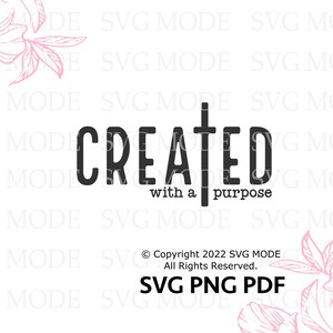 May include: Black and white graphic design with the text "CREATED with a purpose" and a cross. The design is surrounded by pink floral illustrations.
