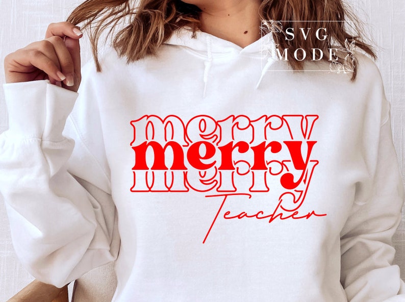 May include: White hoodie with red text that reads "merry merry teacher" in a retro font.