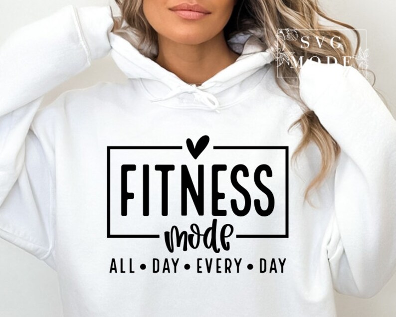 May include: White hoodie with black text that reads "Fitness mode all day every day" with a small heart above the word "Fitness".