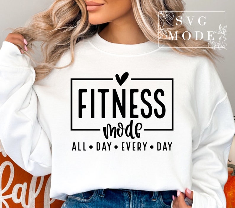 May include: White sweatshirt with a black graphic that says "Fitness mode" with a heart above the text and "All Day Every Day" below the text.