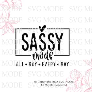 May include: Black and white graphic design with the text "SASSY MODE" in a box with a heart above the text. Below the box is the text "ALL DAY EVERY DAY". The design is surrounded by pink floral illustrations.