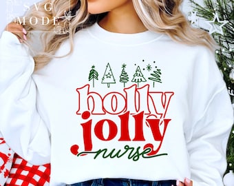 May include: White sweatshirt with a red and green design that says "holly jolly nurse" with a green Christmas tree design above the text.