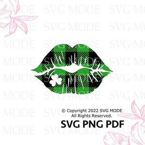 May include: A green and black plaid lip print with a shamrock in the center. The lip print is a digital design for crafting projects.