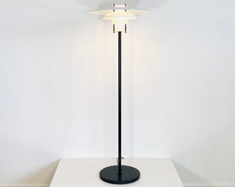 A Danish 1980s black & white floor lamp by Lanterna Danica