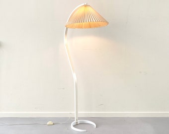 A white Danish Caprani floor lamp