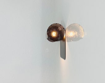 A minimalistic 1980s black wall lamp by Lyfa Denmark